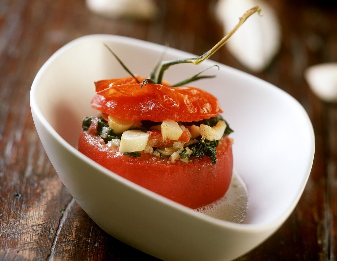 Tomato stuffed with catfish salad