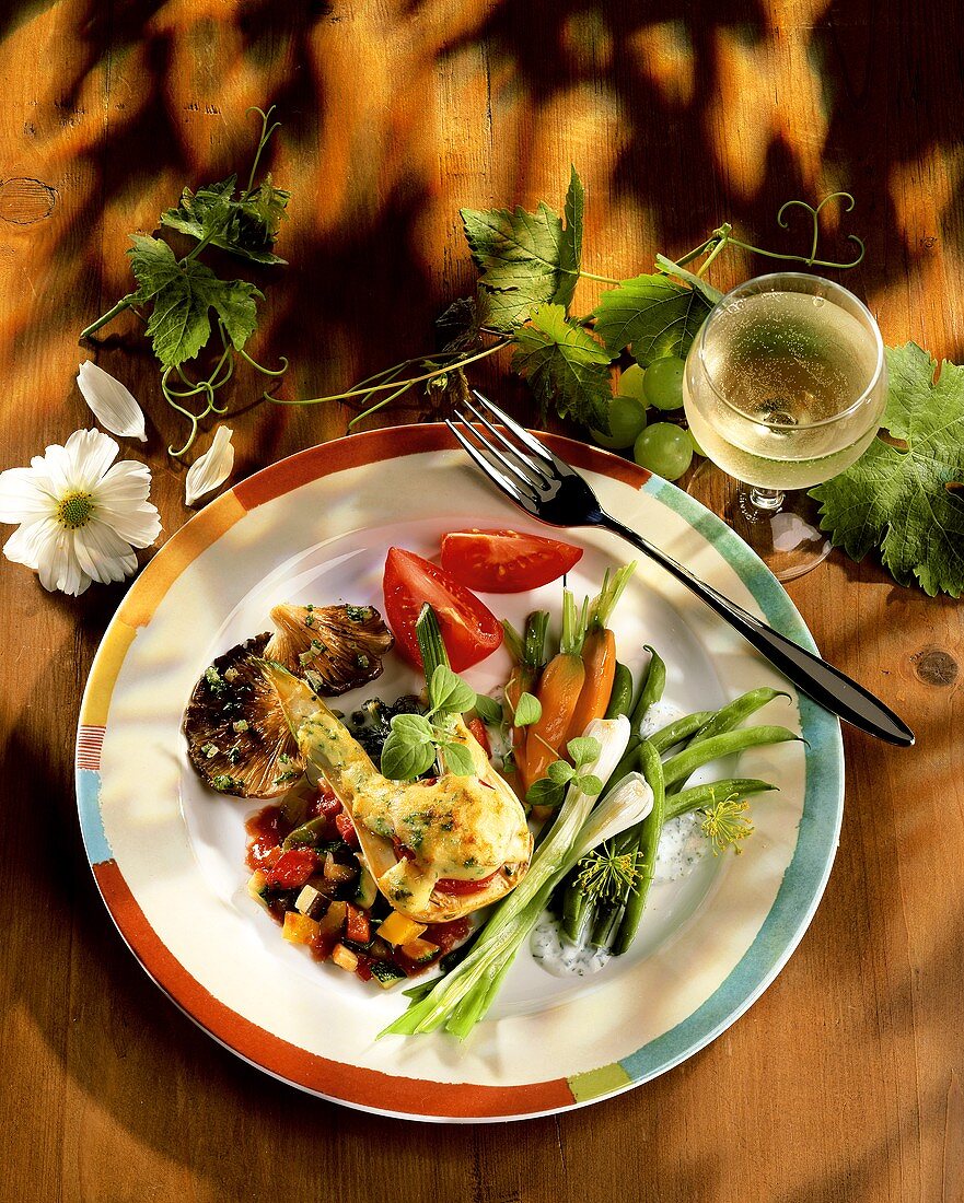 Plate of vegetables and a glass of wine