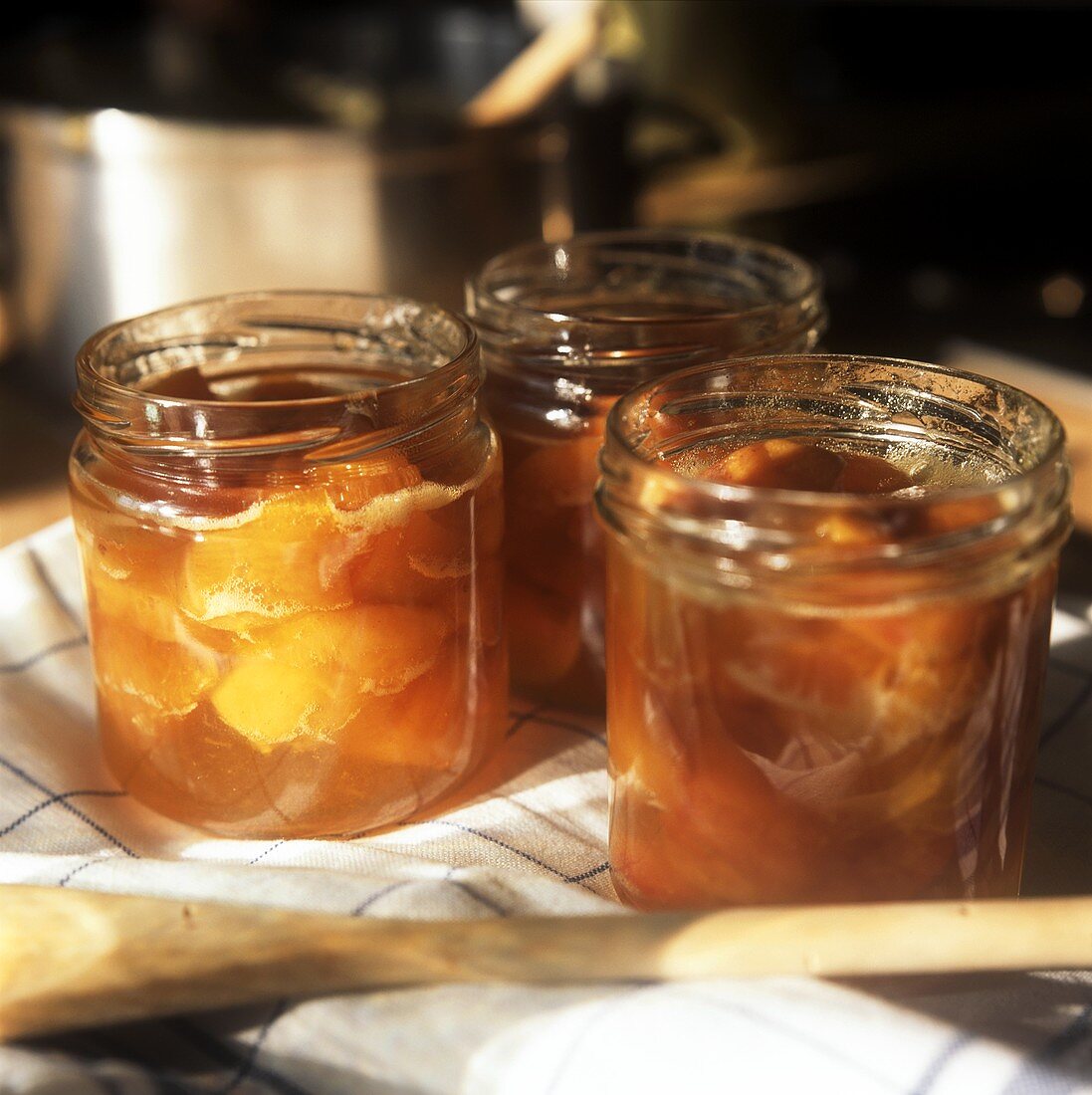 Apricot jam in preserving jars