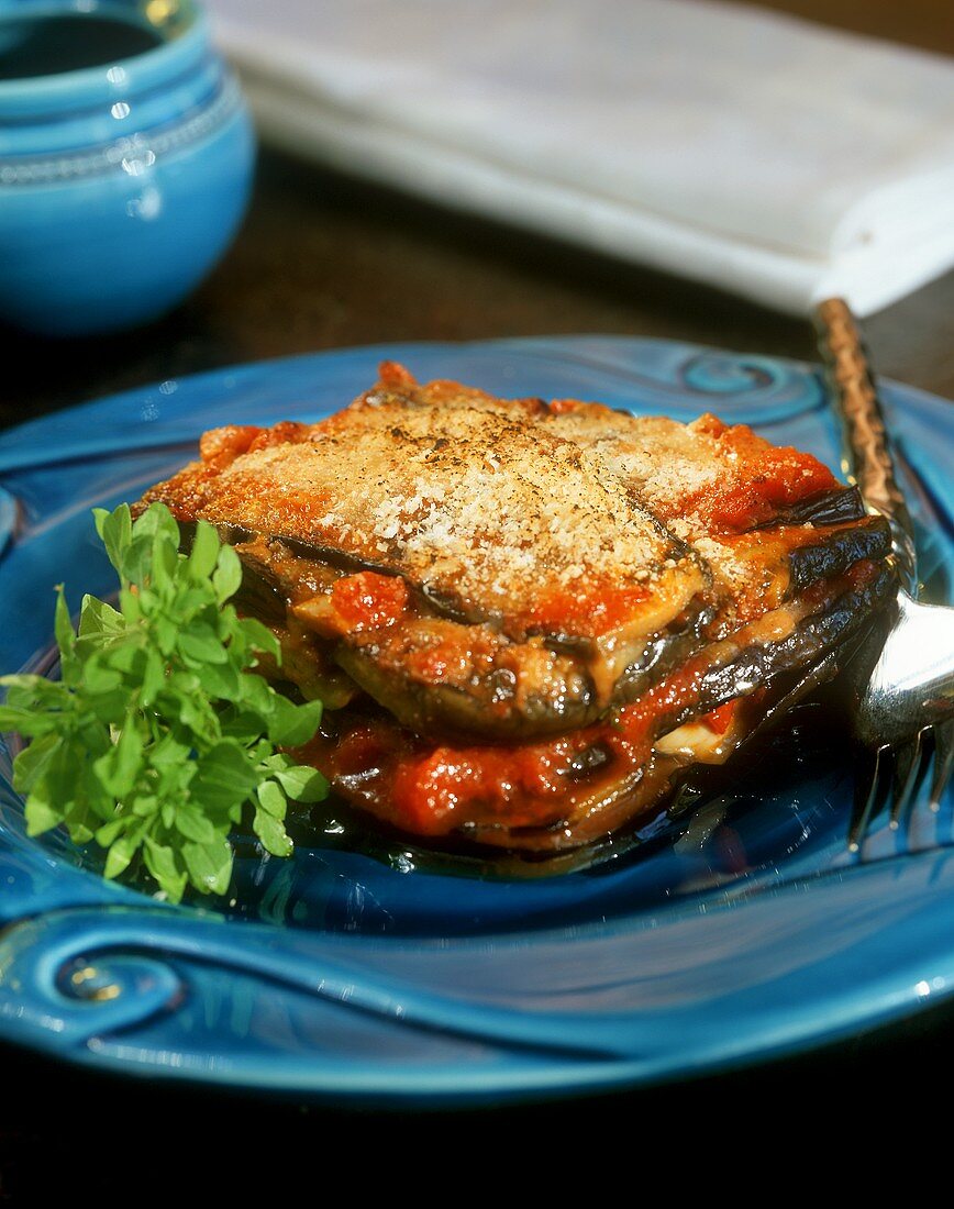 A piece of aubergine and tomato bake