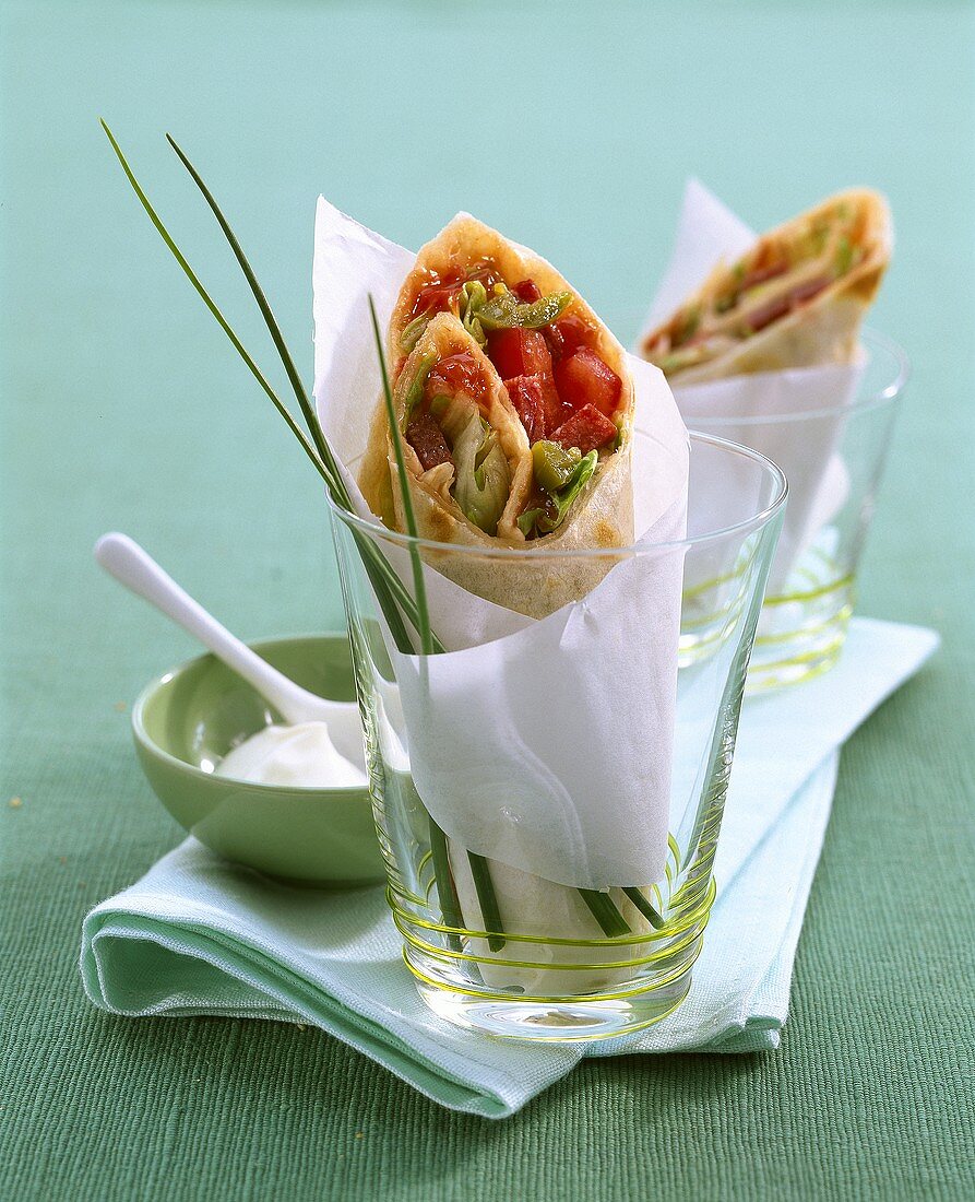 Spicy salami wraps with jalapeno peppers and tomatoes