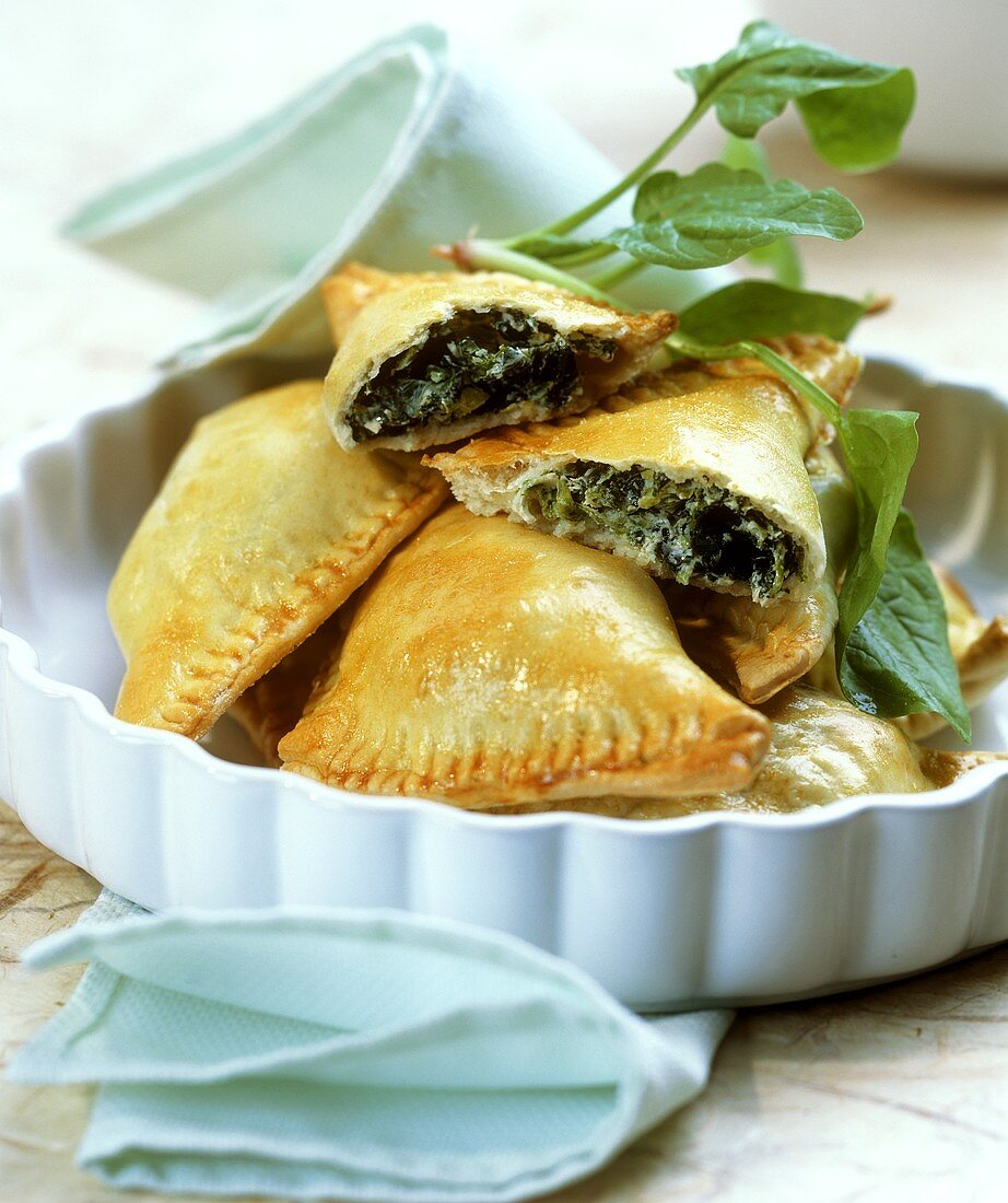 Pasties filled with spinach and ricotta