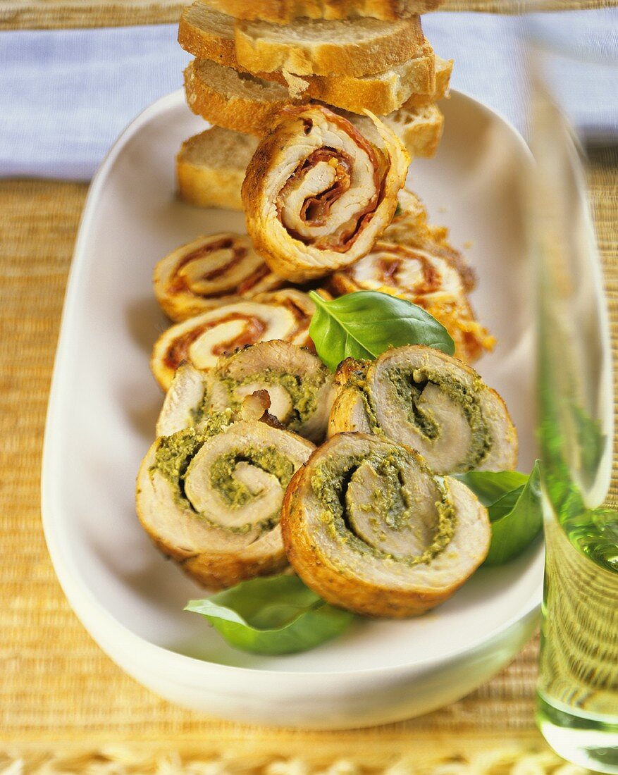 Escalope roulades with pesto (front) and with paprika salami