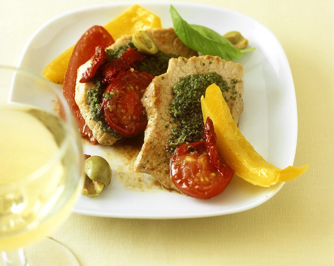 Pepper escalope with pesto and tomatoes