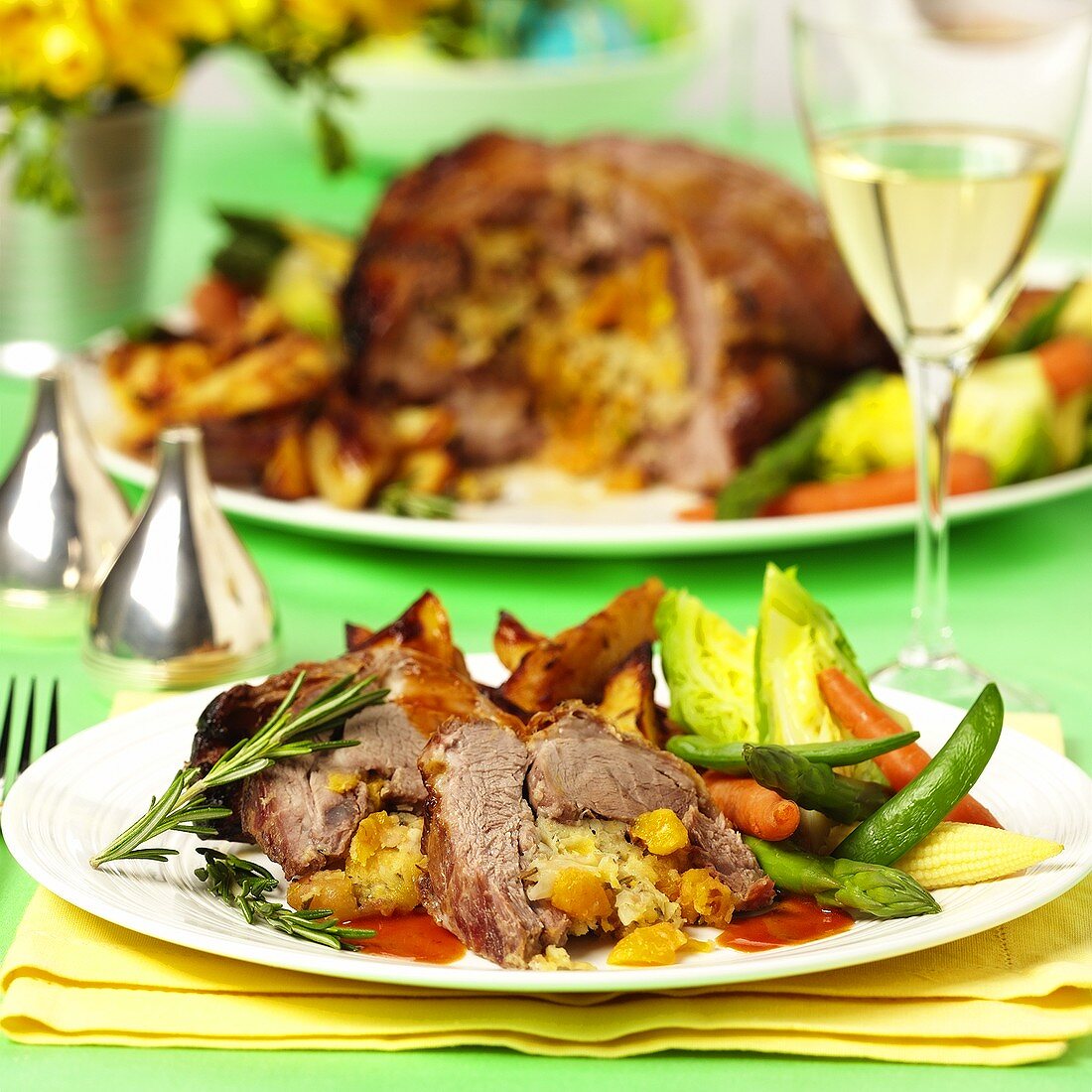 Roast lamb with pumpkin and carrot stuffing & vegetables