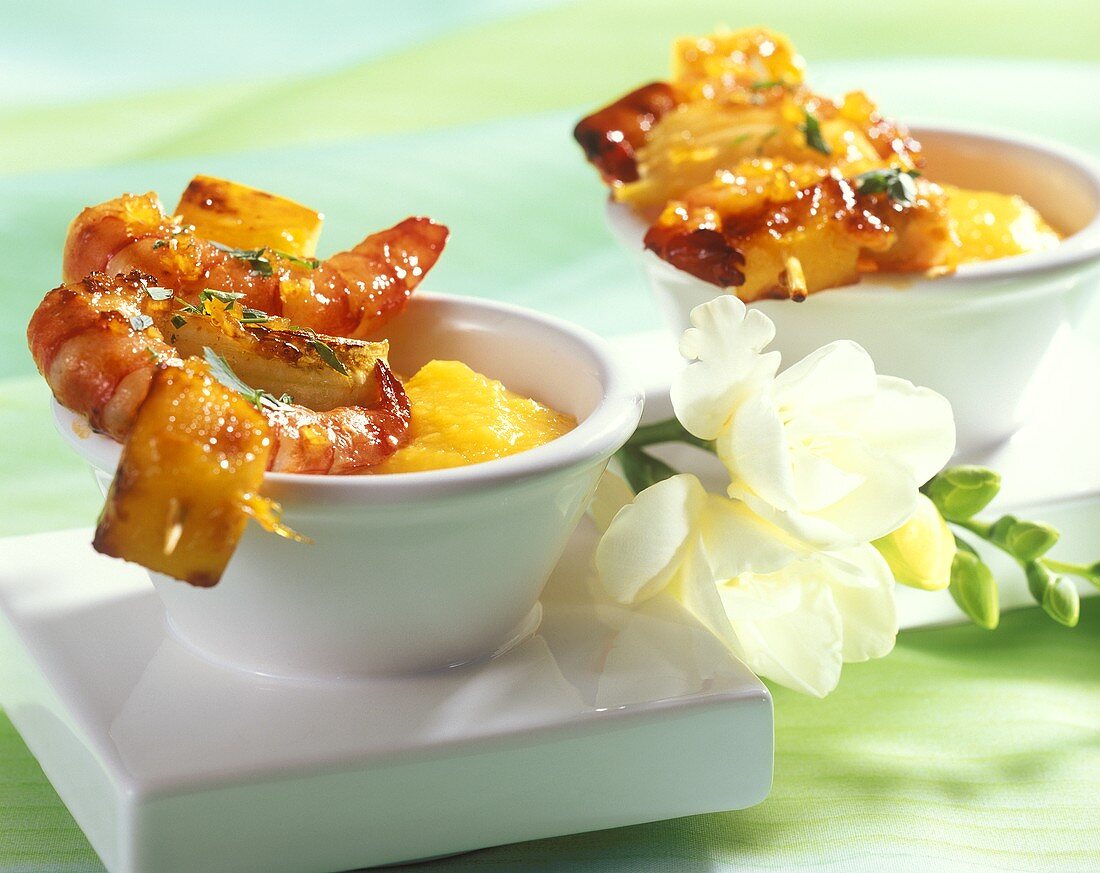 Barbecued shrimp kebabs with mango sauce