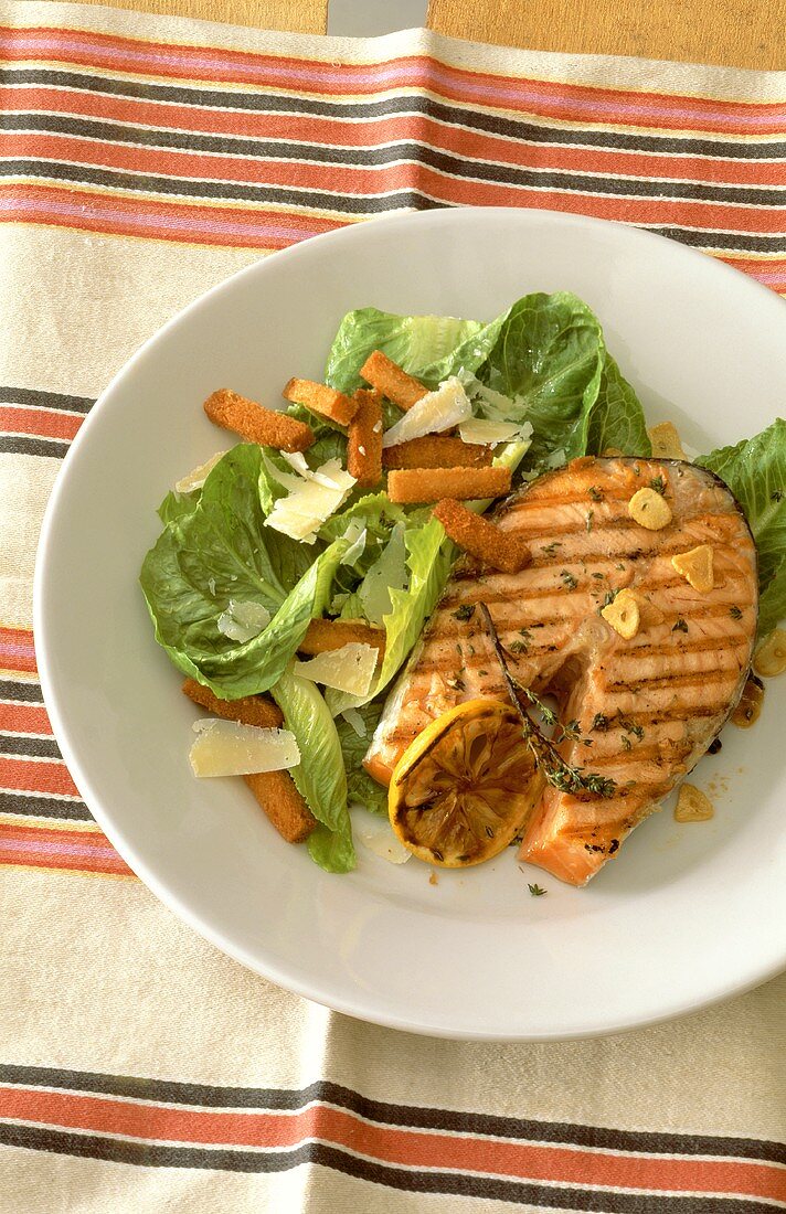 Barbecued salmon cutlet with Caesar salad