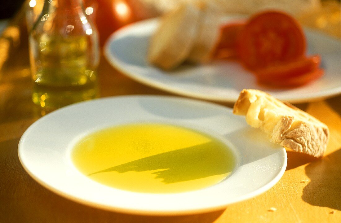 Olive oil tasting - plate with oil and ciabatta for tasting 