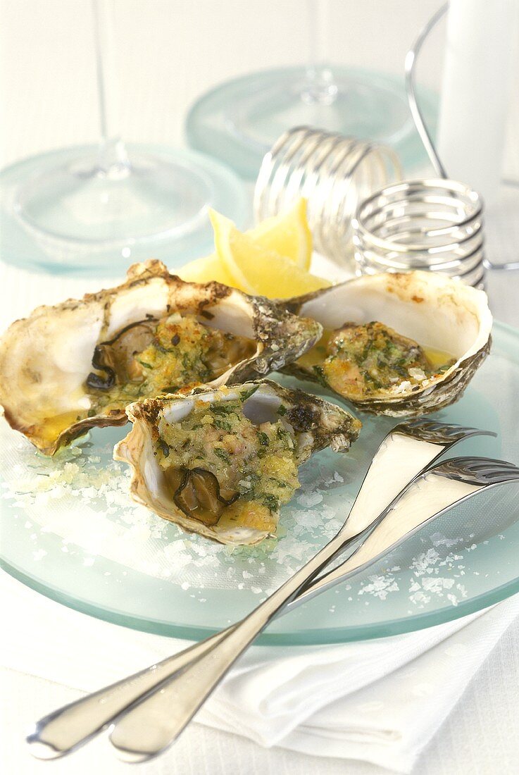 Oysters au gratin with garlic and herbs