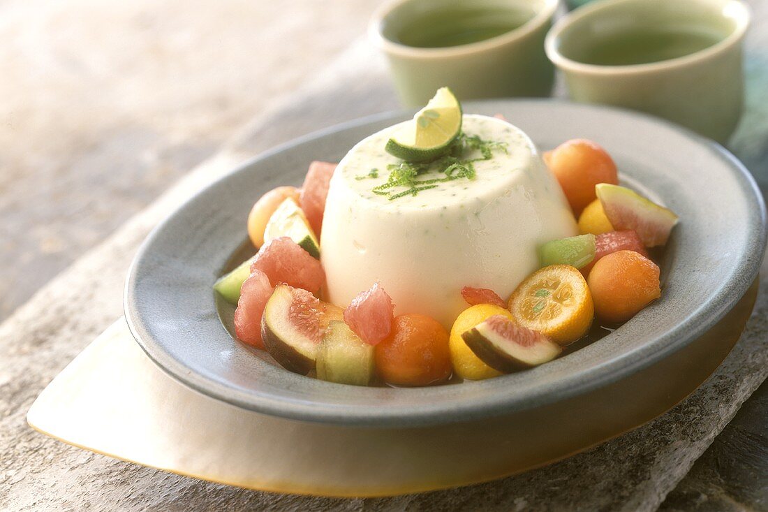 Turned-out tea mousse with exotic fruit salad