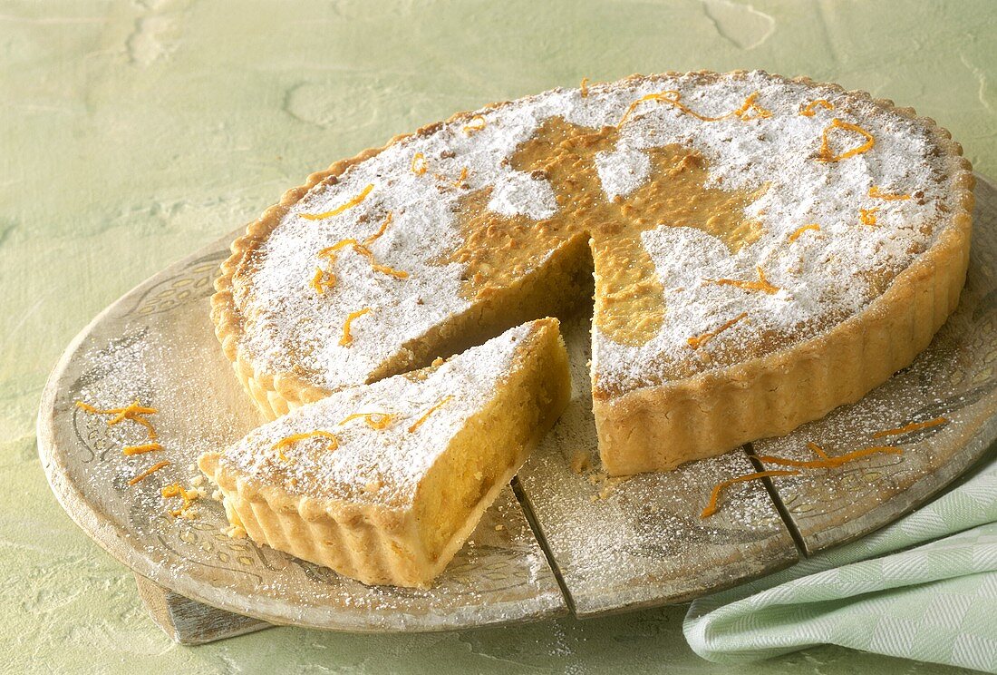 Almond tart, a piece cut