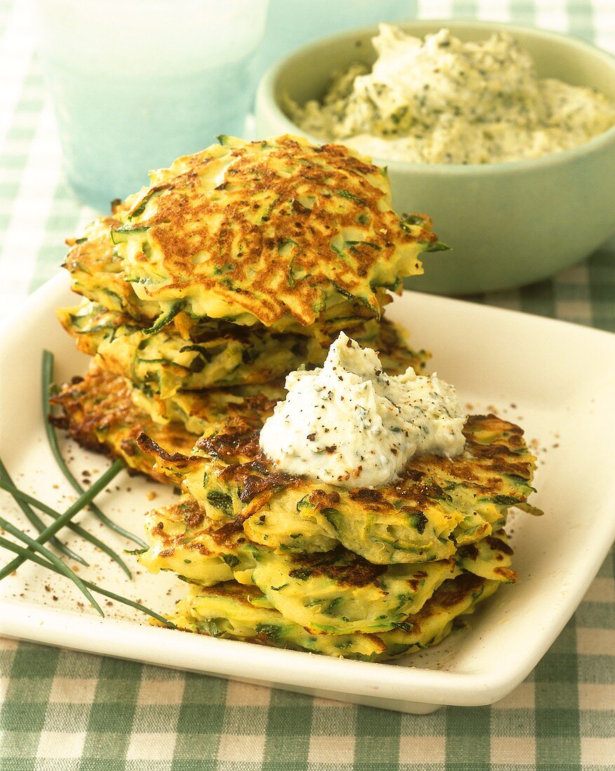 Courgette and potato cakes with herb creme fraiche