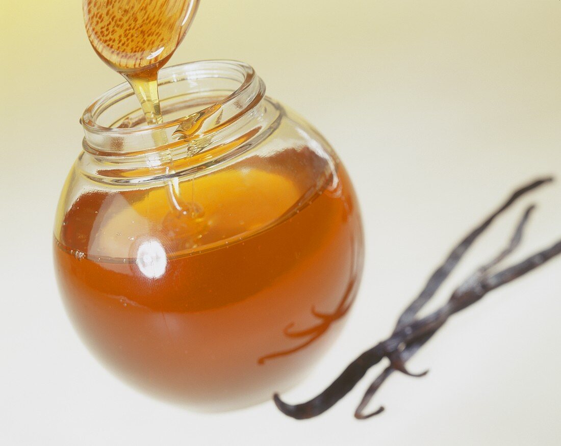 Jar of honey and vanilla pods
