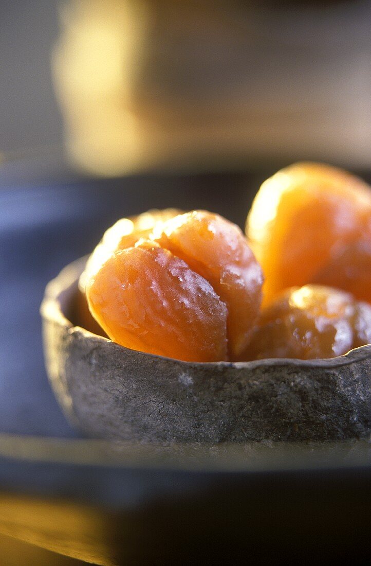 Terracotta bowl of candied sweet chestnuts