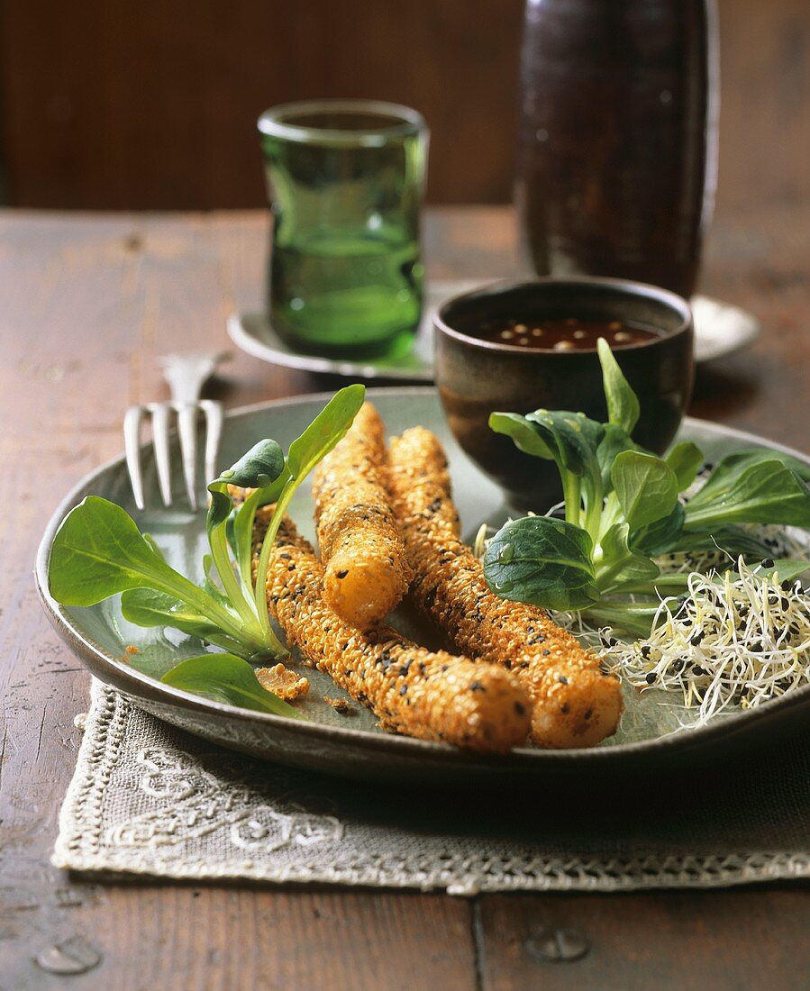 Sesame-coated scorzonera with corn salad