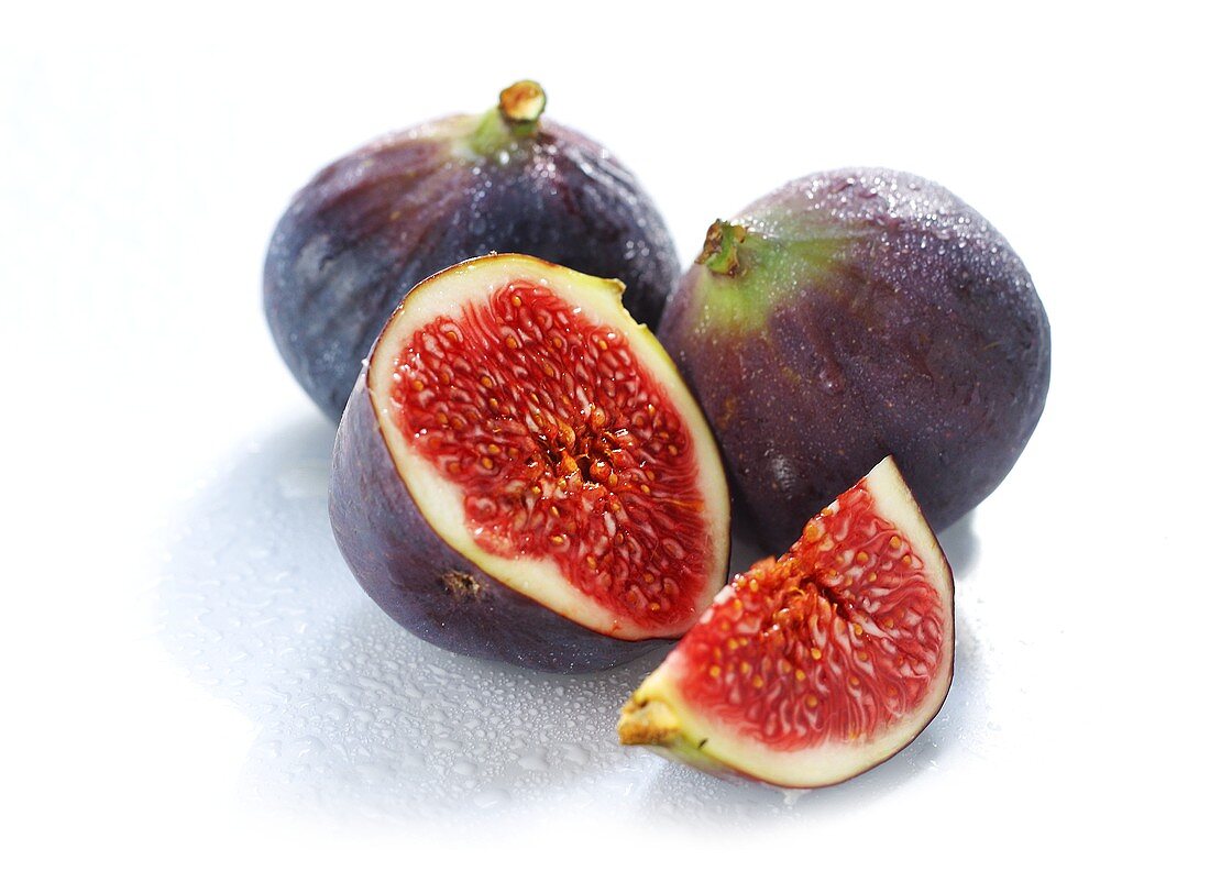 Three figs, one cut open