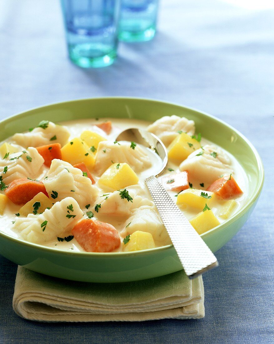 Fish stew with potatoes and carrots