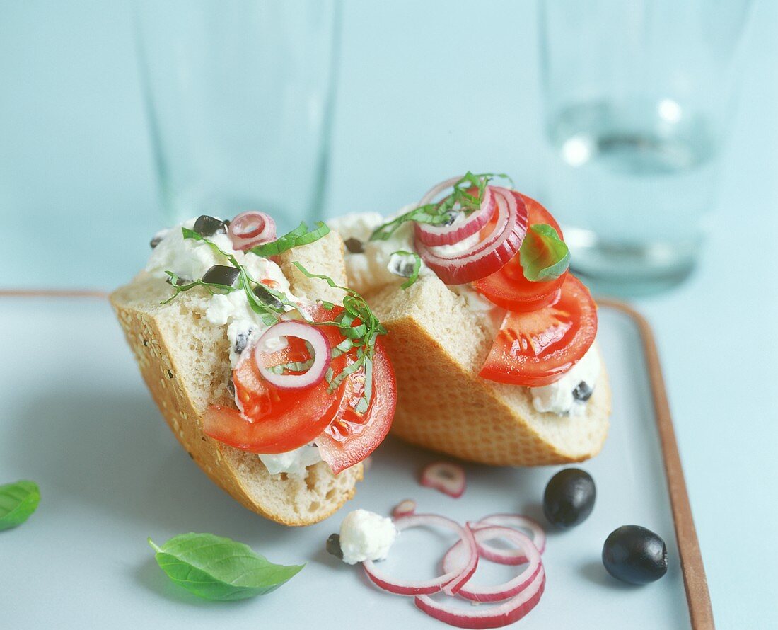 Pita triangles with feta, tomatoes and olives