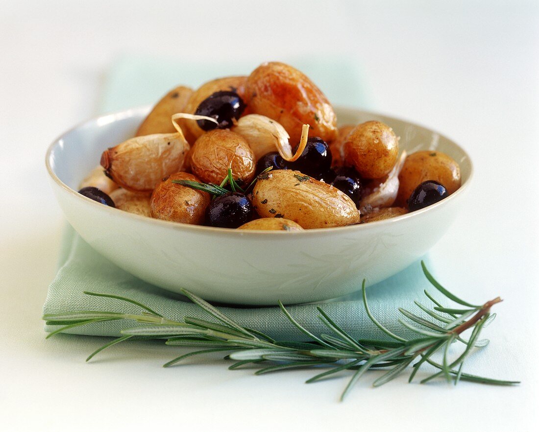 Potatoes with olives, garlic and rosemary