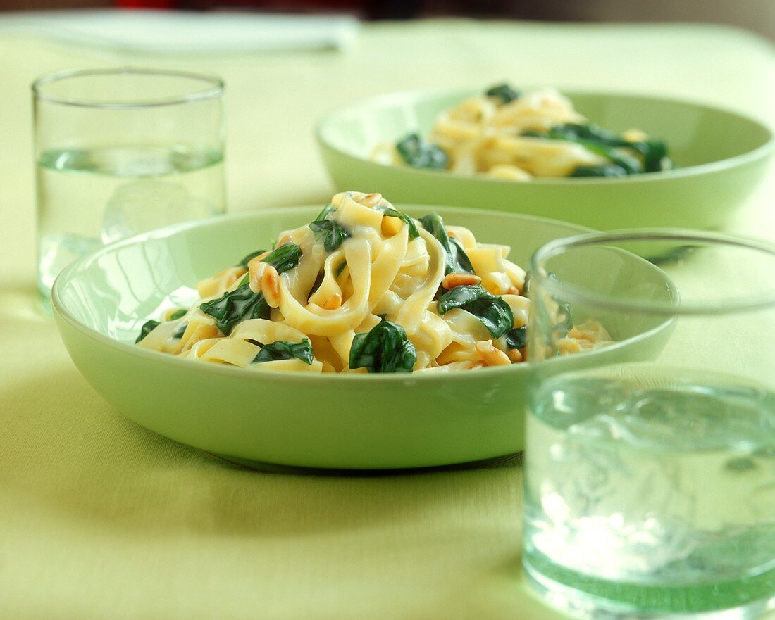 Tagliatelle with spinach and pine nuts