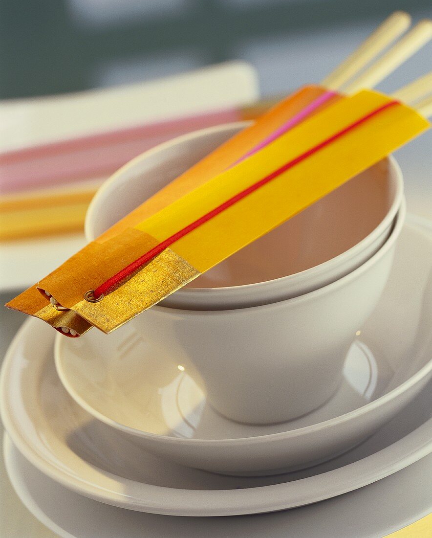 Asian place setting with chopsticks in home-made packets