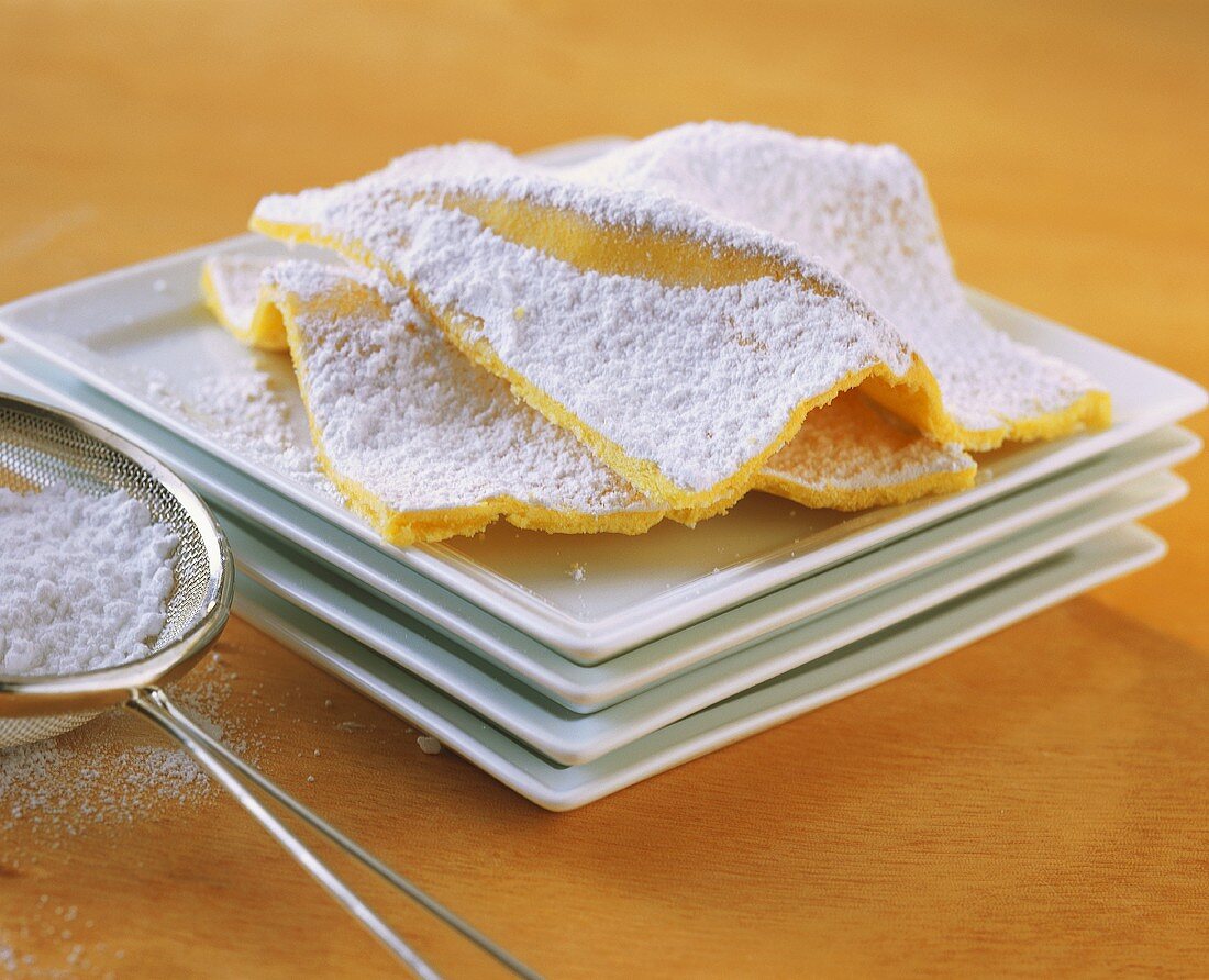 Wave cake (thin tray-baked cake with icing sugar)