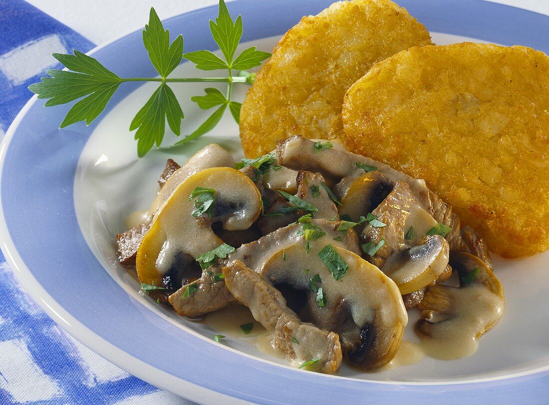 Züri Gschnätzlets with rosti (Sliced meat Zurich-style)