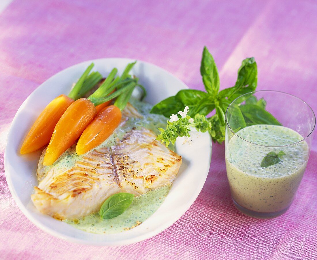 Hake with carrots and herb sauce