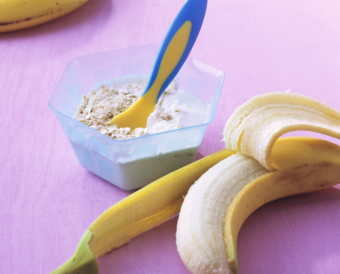 Muesli with rolled oats and banana for baby