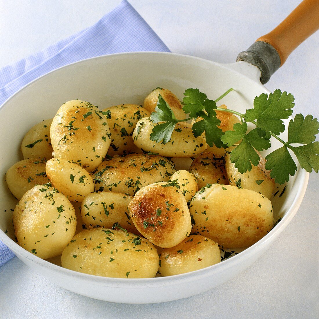Golden brown fried parsley potatoes