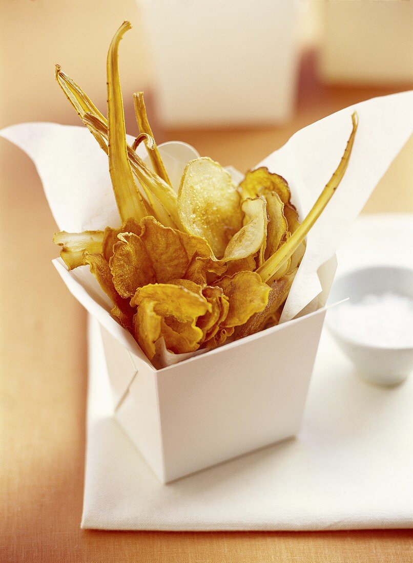 Root vegetable crisps in cardboard container