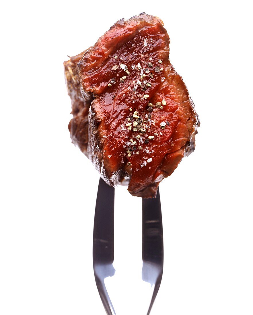 Rare steak with pepper