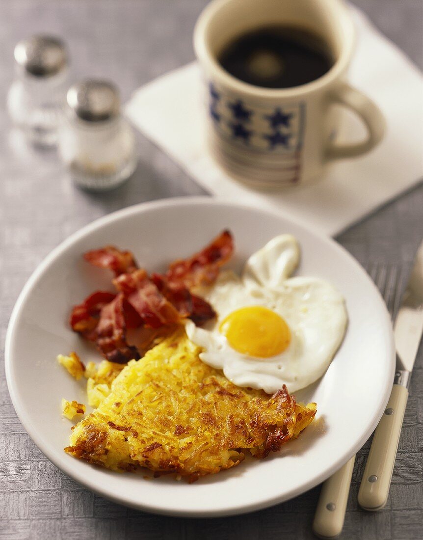 Rosti with fried egg and bacon