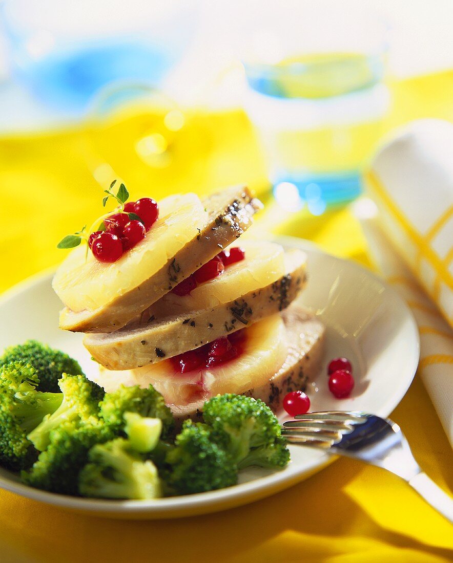 Pork with pineapple slices and broccoli