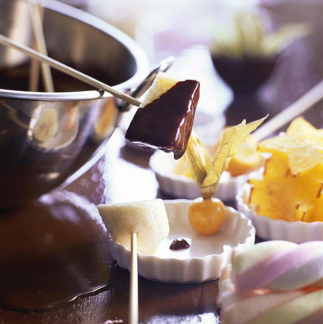 Chocolate fondue with tropical fruit