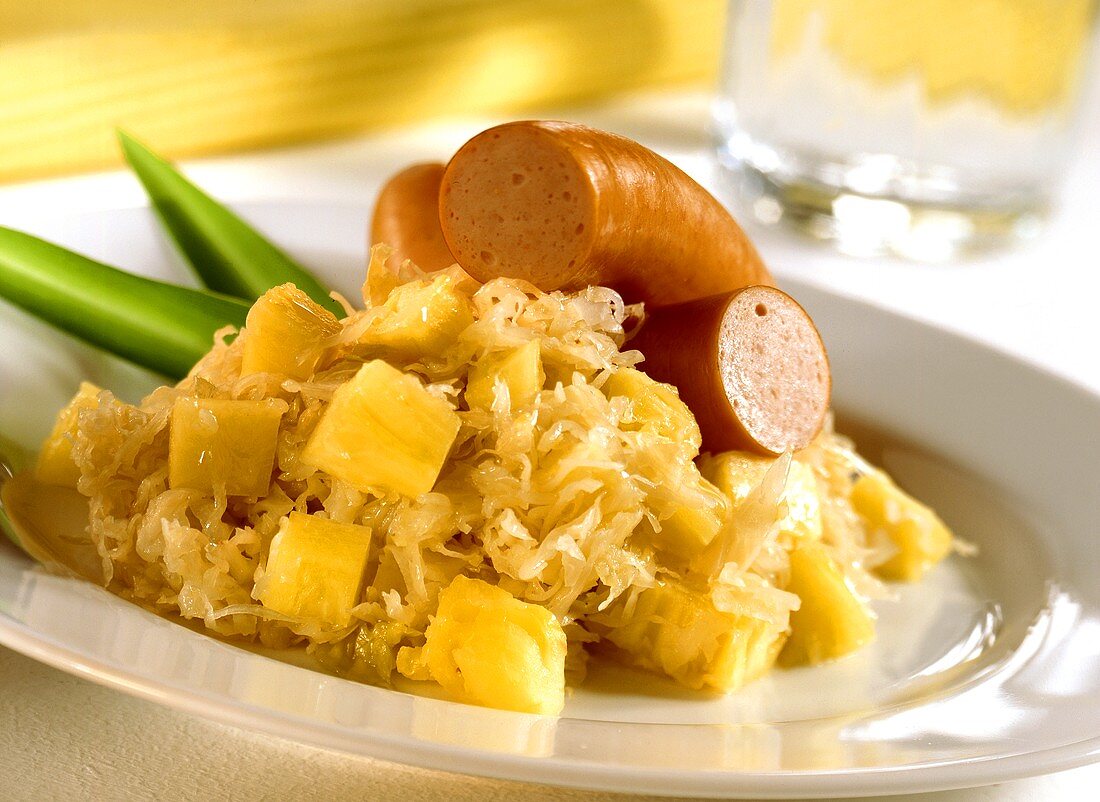 Pineapple sauerkraut with poultry sausages (food combining)