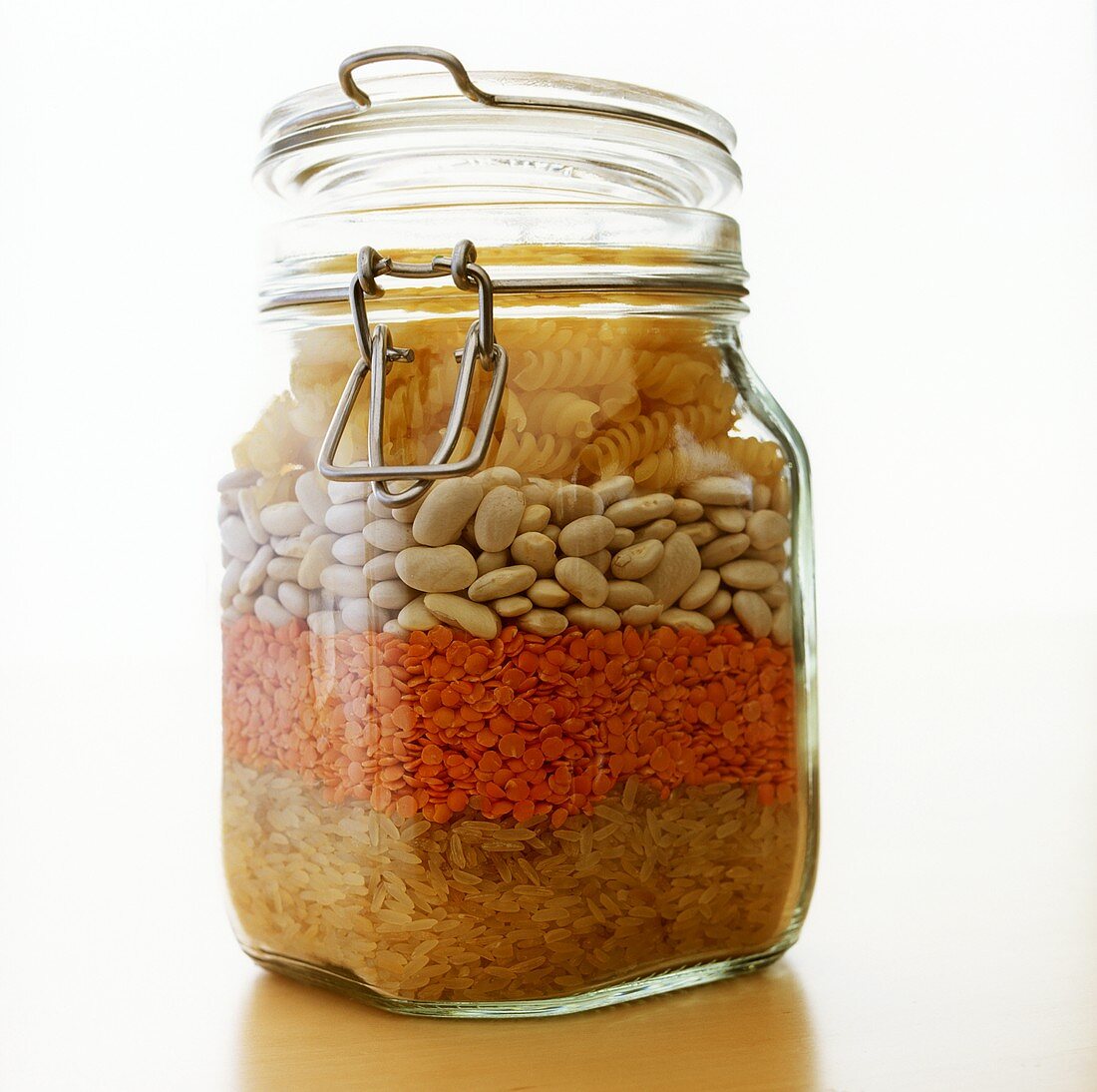 Rice, lentils, beans, pasta - in a storage jar
