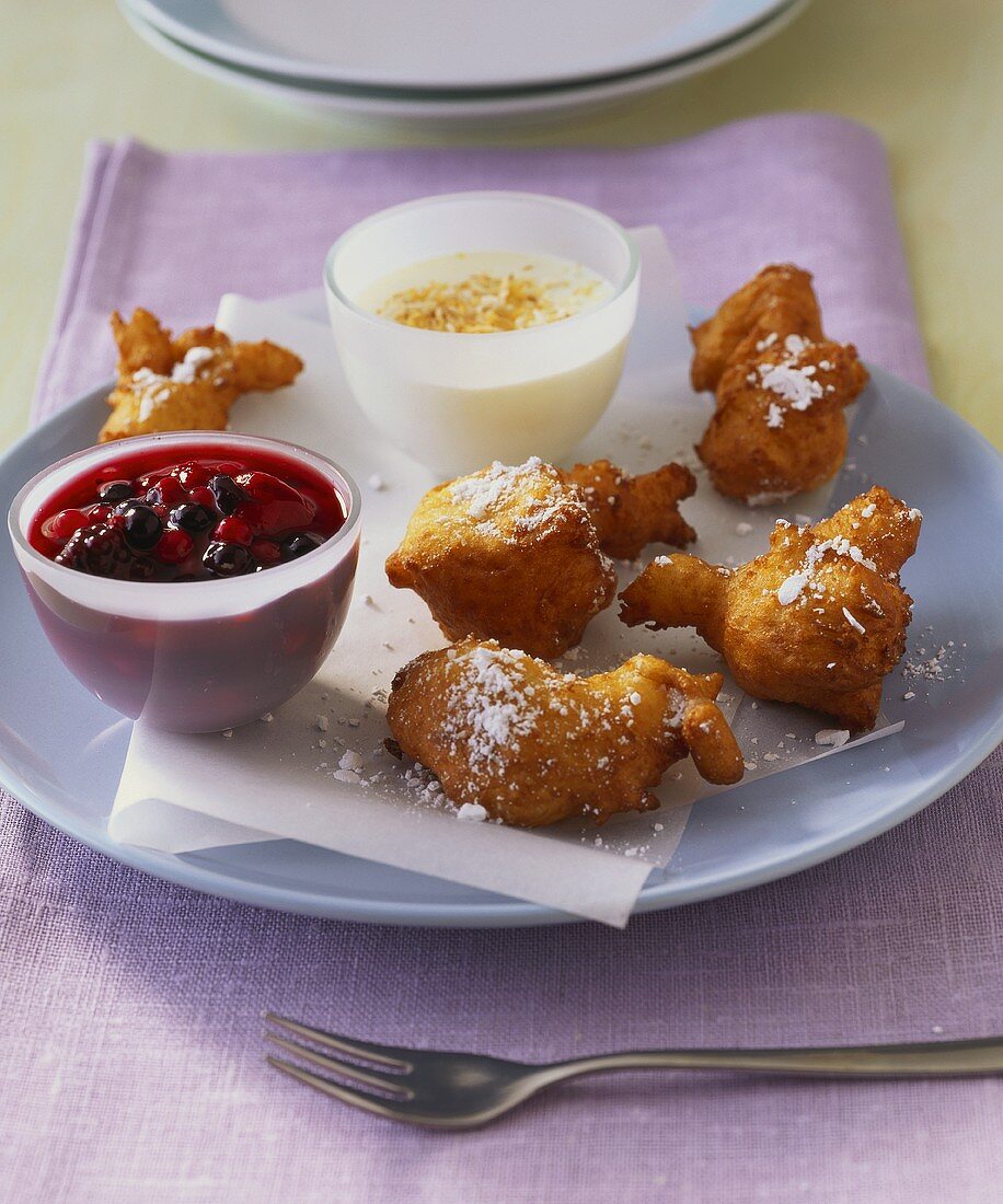 Doughnuts with berry- and coconut sauce