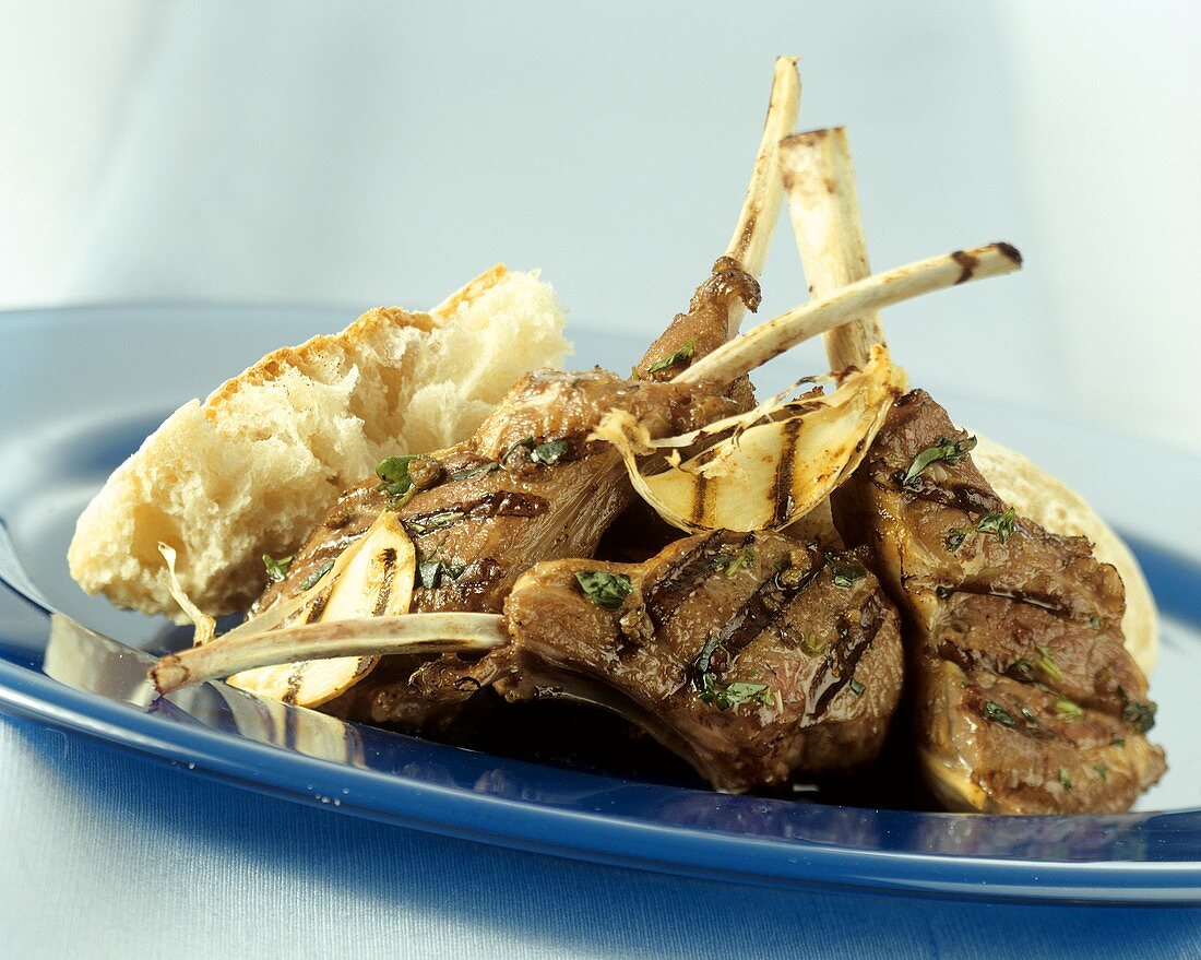 Barbecued lamb chops with garlic and thyme oil