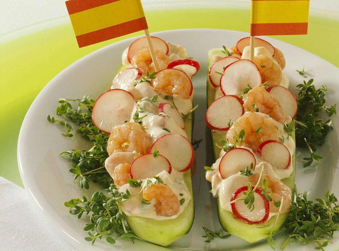 Cucumber boats with radish and shrimp filling and cress