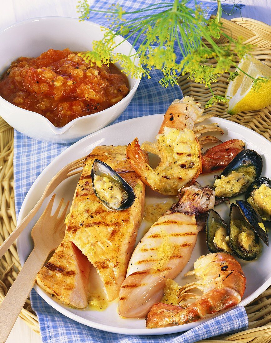 Creole barbecued seafood platter with salsa criolla