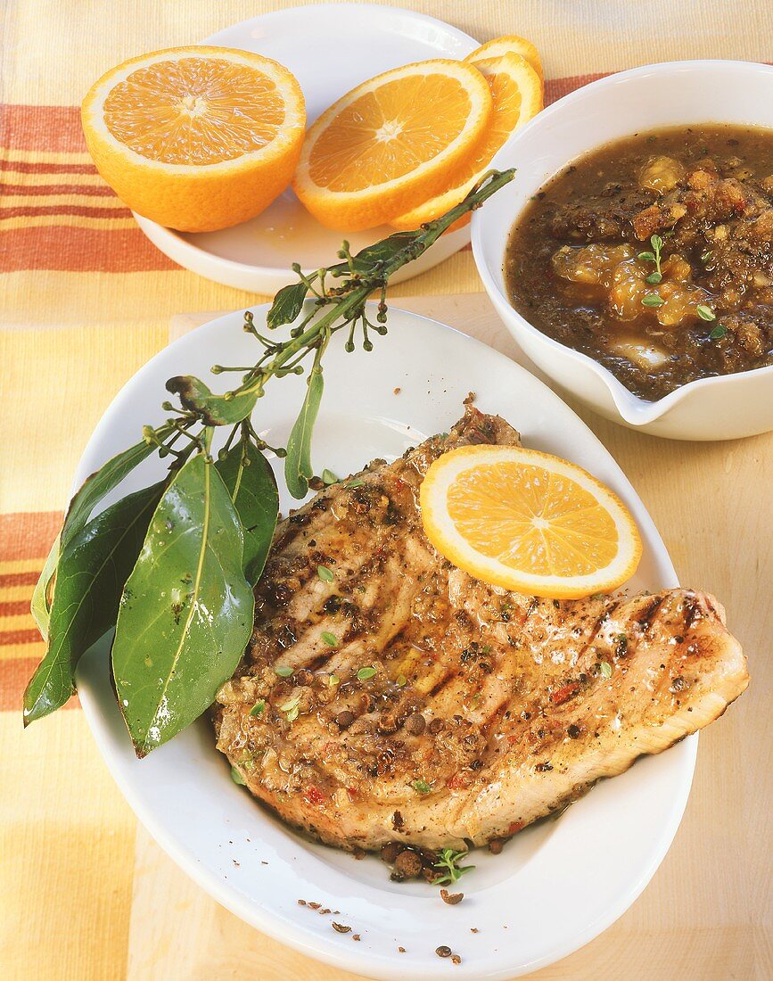 Pork chop with spicy orange sauce