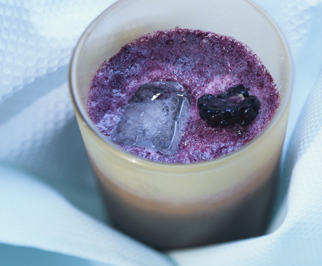 Blackberry smoothie with ice cube