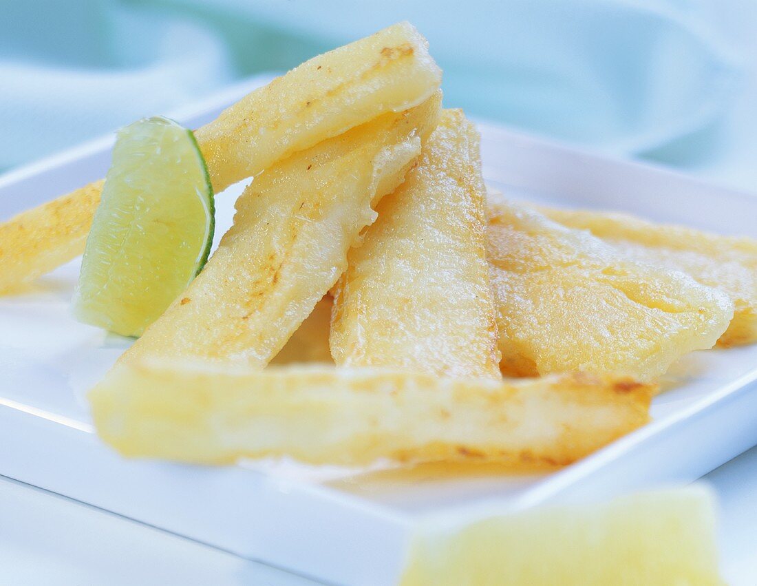 Fried cheese with wedge of lime