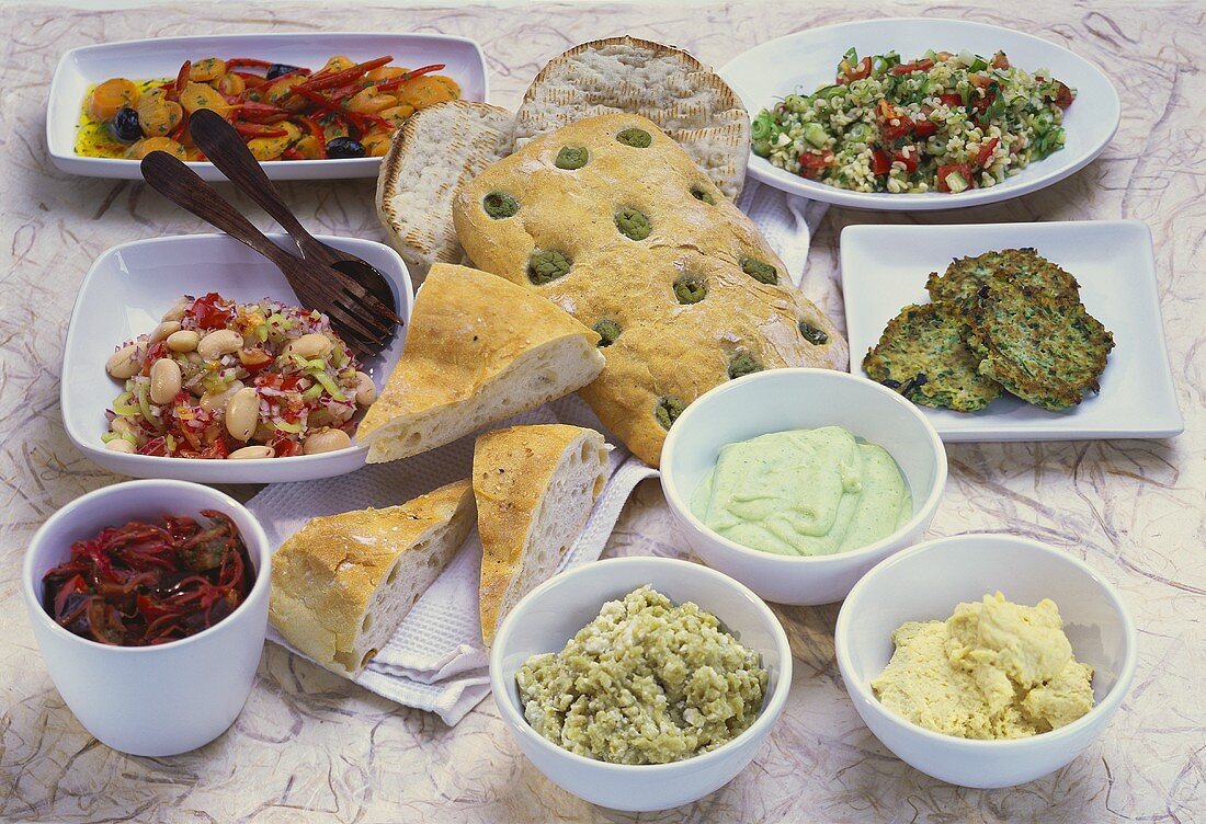 Mediterranean buffet with olive bread, antipasti and spreads