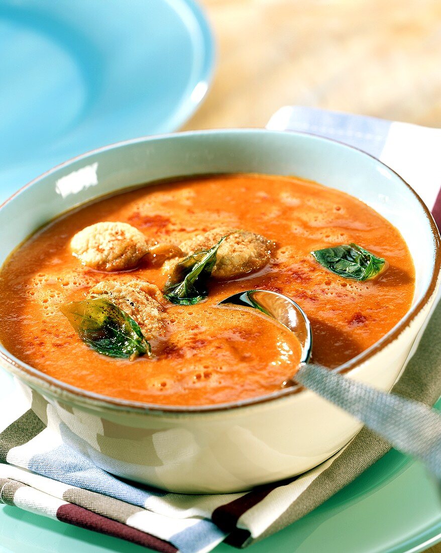 Creamed pepper soup with basil beignets