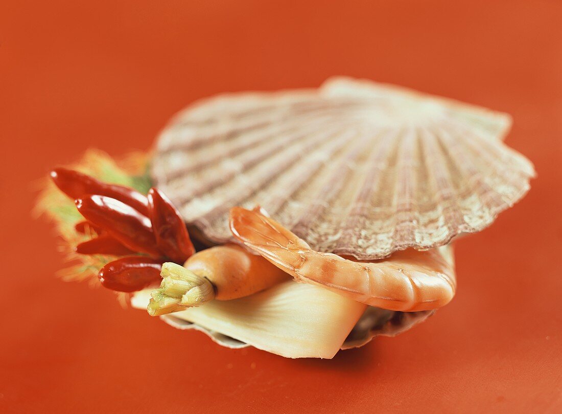 Shrimp and vegetables in scallop shell