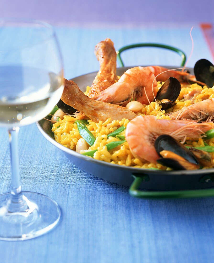 Paella valenciana with chicken and seafood