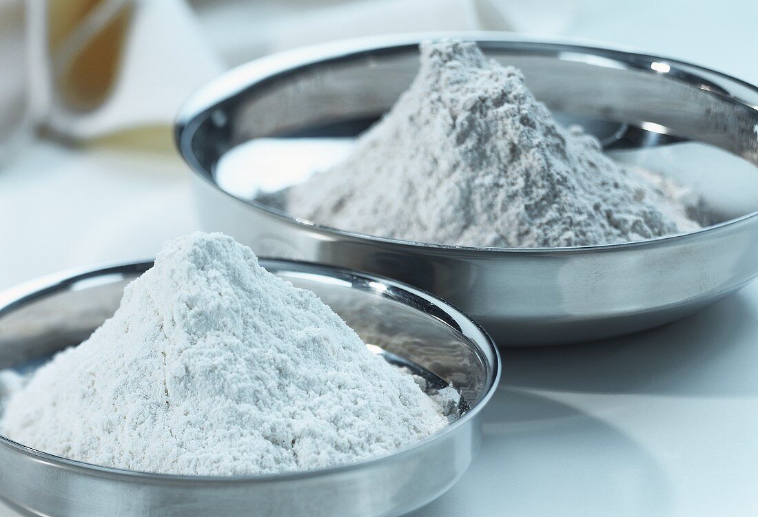 Wheat flour in metal bowls