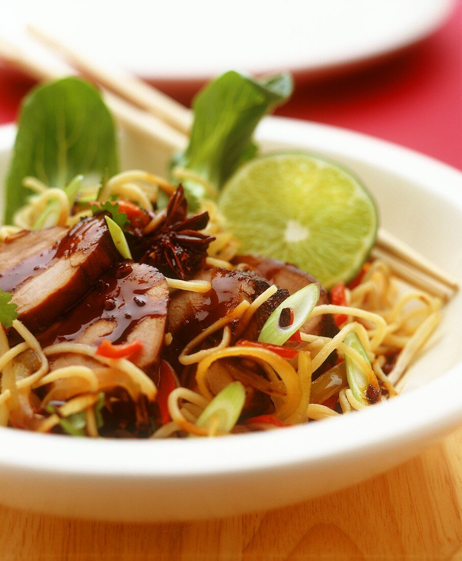 Chinese style roast pork with noodles, chili 